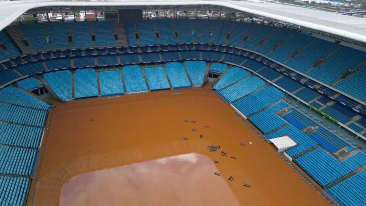 Grêmio e Inter aguardam água abaixar para avaliar prejuízos nos estádios Lorena Bueri