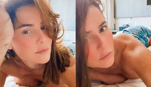 Deborah Secco faz topless em seu quarto de hotel Lorena Bueri
