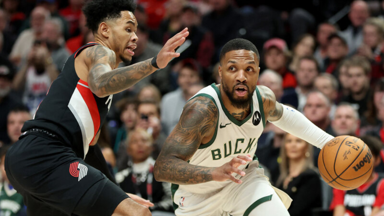 Antetokounmpo volta a pôr Deandre Ayton no bolso e leva Portland à vitória contra os Bucks