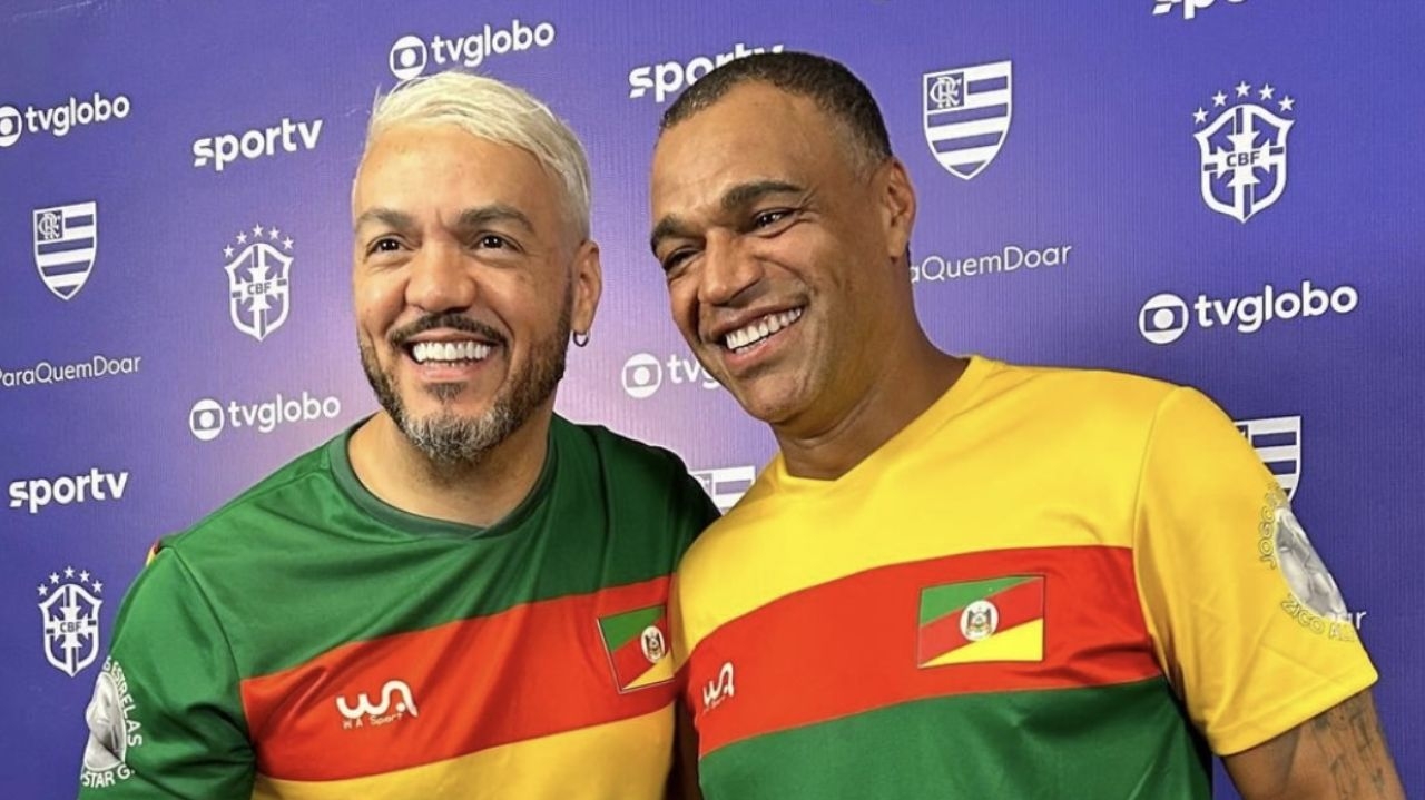 Belo e Denílson fazem as pazes em futebol solidário
