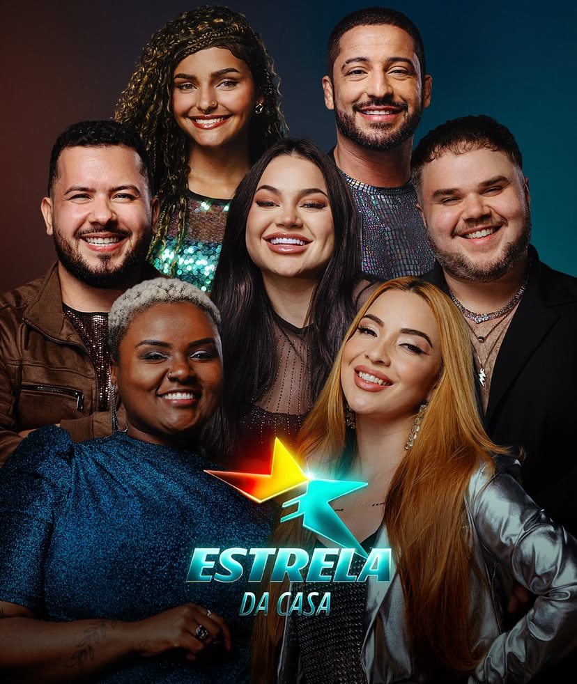Imagem promocional do Estrela da Casa exibindo parte dos participantes em destaque, com o logotipo do programa e elementos gráficos coloridos. 